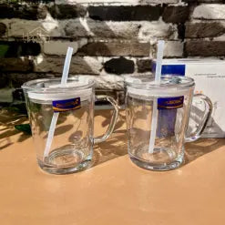 transparent glass coffee mug with straw